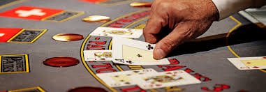 Baccarat card deal Baccarat dealing cards with player and banker hands visible